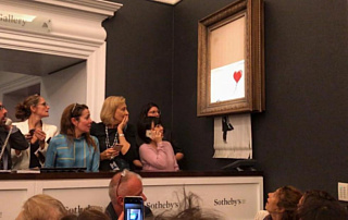 Картина Бэнкси, проданная за $1.4 млн, самоуничтожилась сразу после окончания аукциона