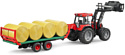 Bruder Bale transport trailer with 8 round bales 02220