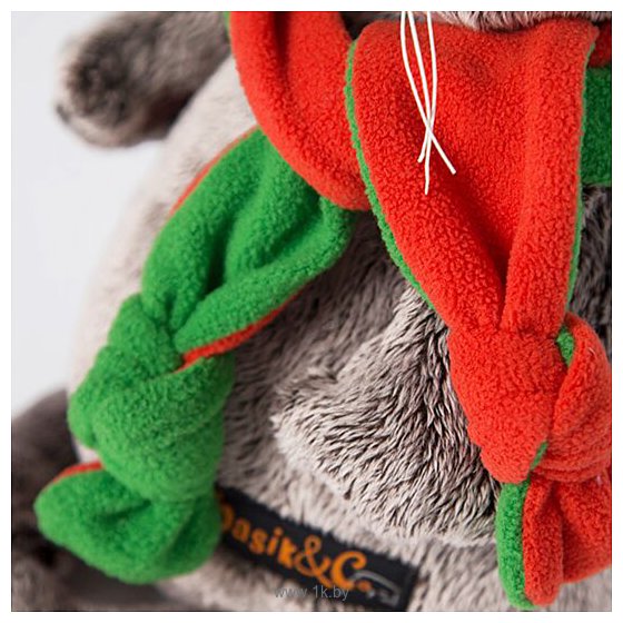 Фотографии Basik & Co Басик в оранжево-зеленой шапке и шарфике 22 см Ks22-087