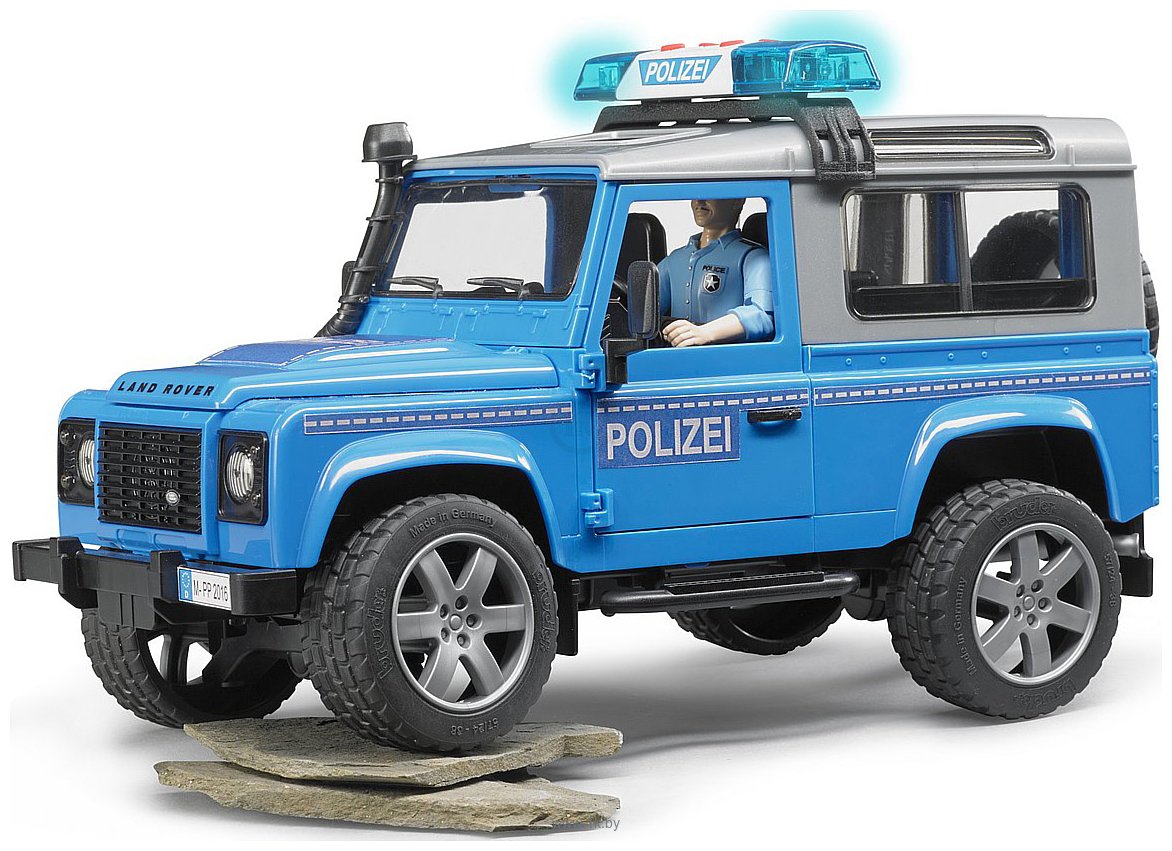 Фотографии Bruder Land Rover Defender Station Wagon Police vehicle 02597